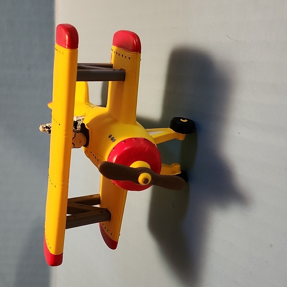 Department 56 yellow airplane